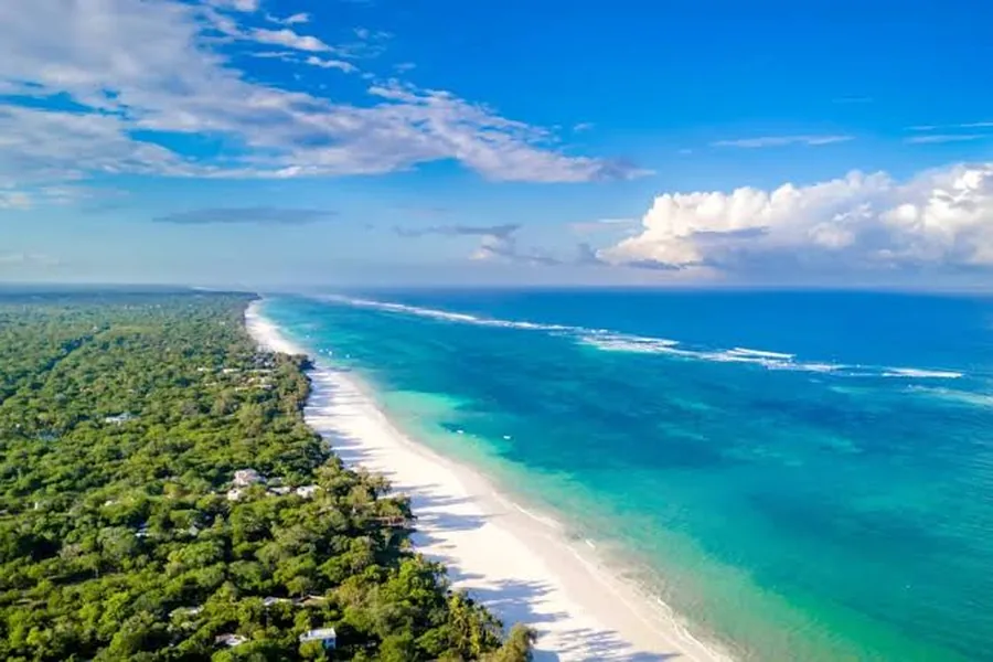 Aerial view of Diani Beach on Kenya's south coast, white sand meeting turquoise Indian Ocean