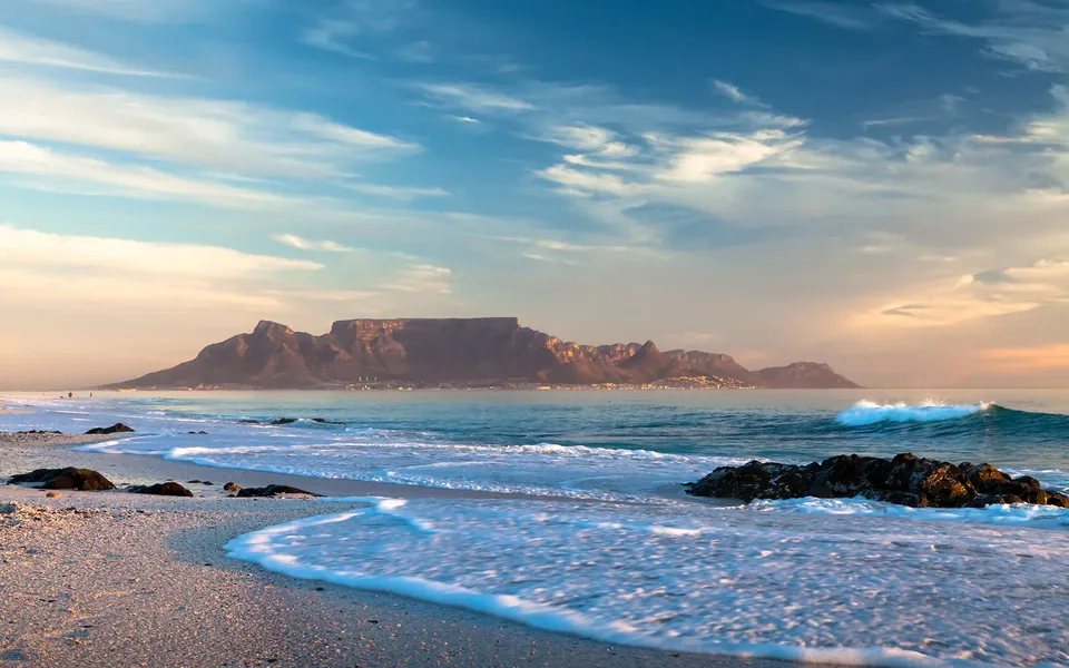 Family looking out over Cape Town and Table Mountain on a South Africa family holiday